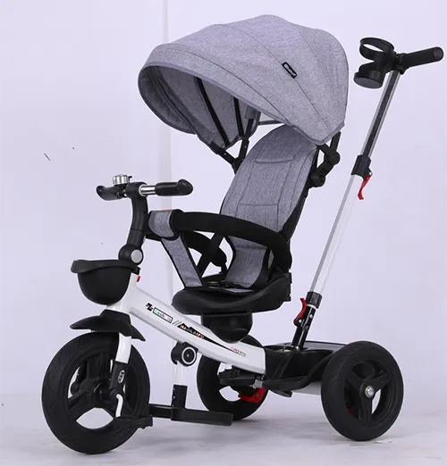 Timoun tricycle ak panyen